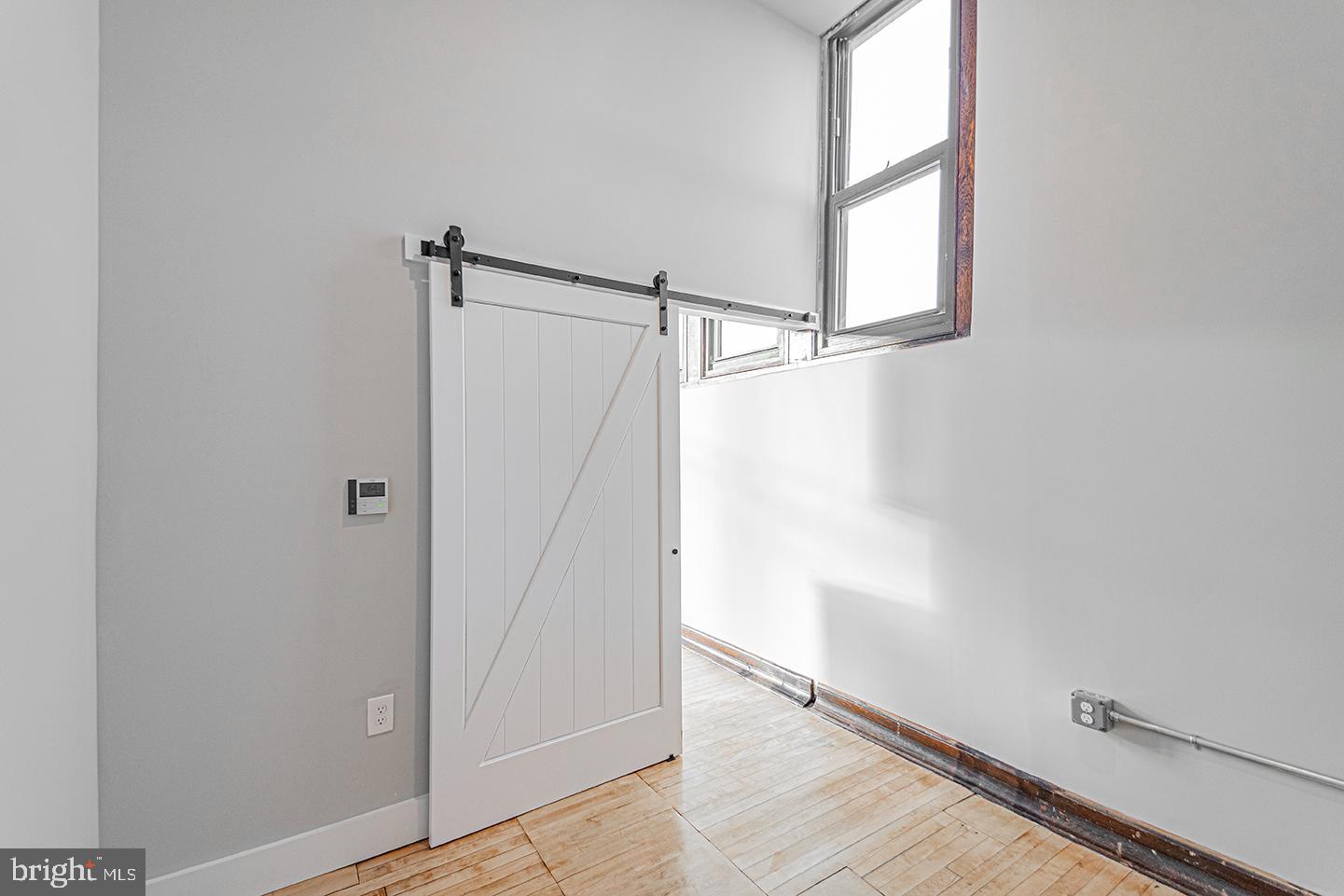 1300 South 19th Street, Unit 316 Philadelphia, PA 19146 - Photo 6 of 19 a view of walk in closet with window