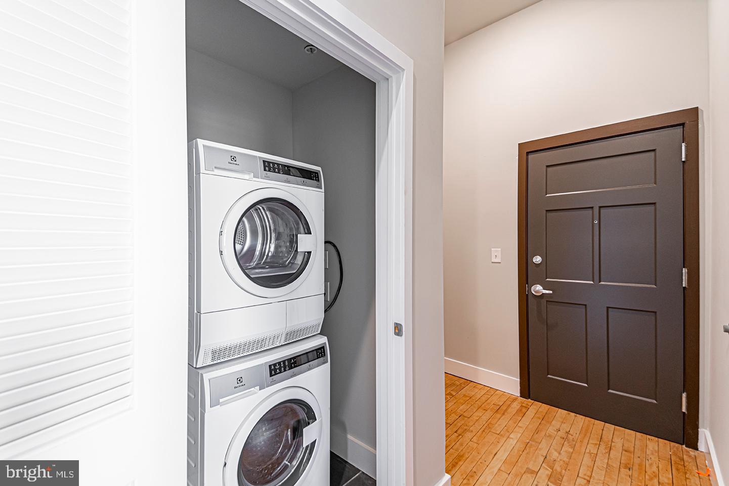 1300 South 19th Street, Unit 316 Philadelphia, PA 19146 - Photo 9 of 19 a view of storage and utility room with washer and dryer
