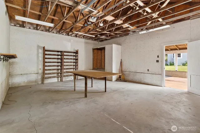 a view of an empty room with a windows