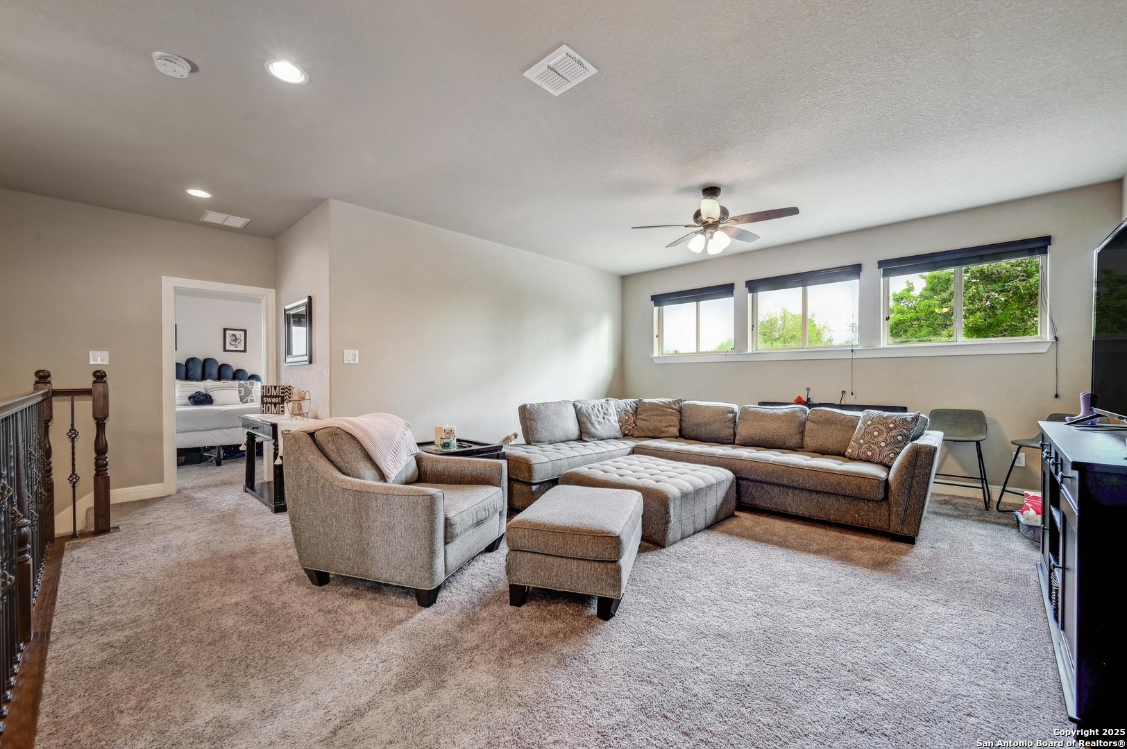 101 La Rosa Drive Blanco, TX 78606 - Photo 16 of 31 a living room with furniture and a large window