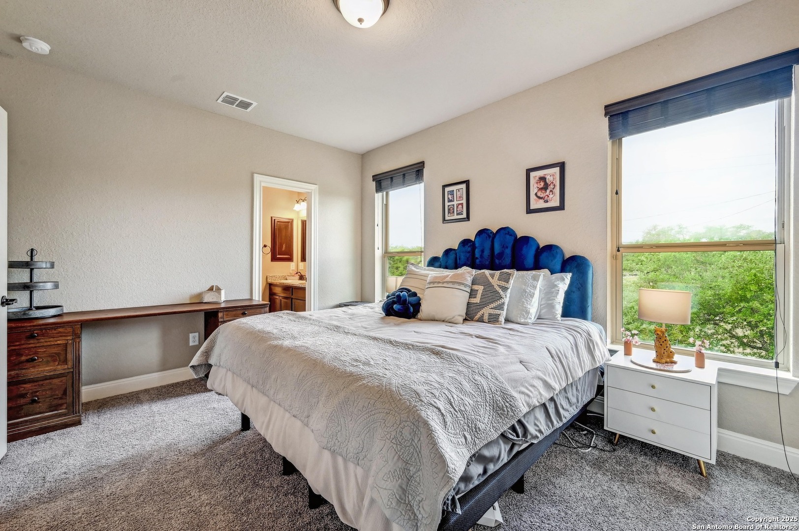 101 La Rosa Drive Blanco, TX 78606 - Photo 17 of 31 a bedroom with bed and window