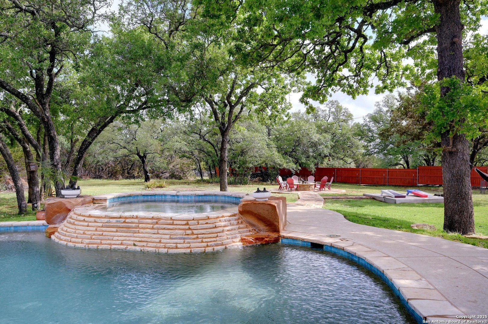 101 La Rosa Drive Blanco, TX 78606 - Photo 23 of 31 a view of a yard with plants and trees