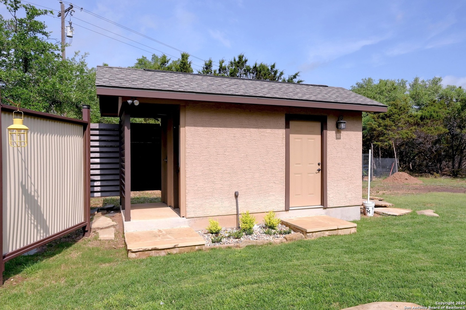 101 La Rosa Drive Blanco, TX 78606 - Photo 25 of 31 a backyard of a house with lots of green space
