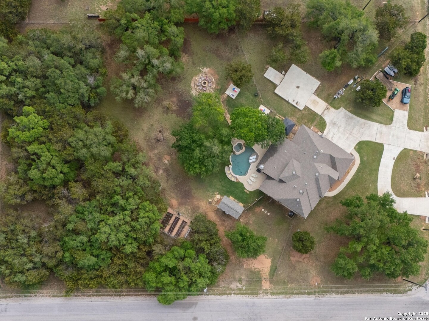 101 La Rosa Drive Blanco, TX 78606 - Photo 29 of 31 an aerial view of a house with outdoor space and lake view