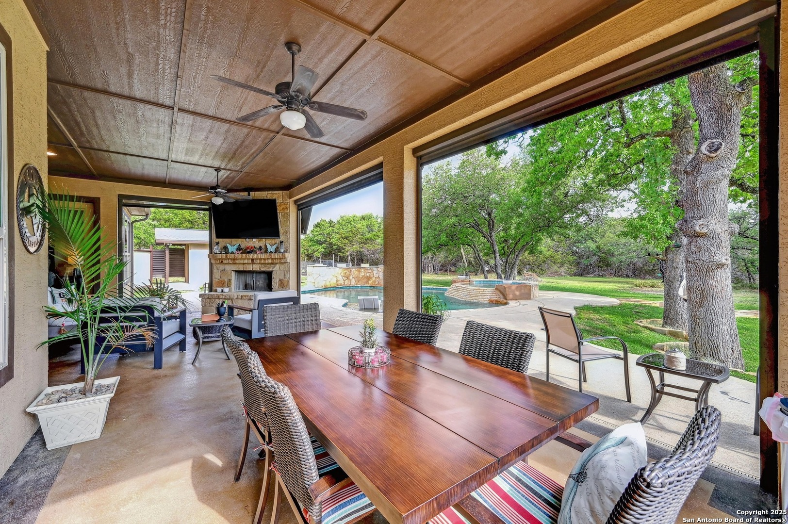 101 La Rosa Drive Blanco, TX 78606 - Photo 3 of 31 a outdoor space with lots of furniture and glass windows