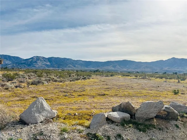 a view of a lake and mountain in the back