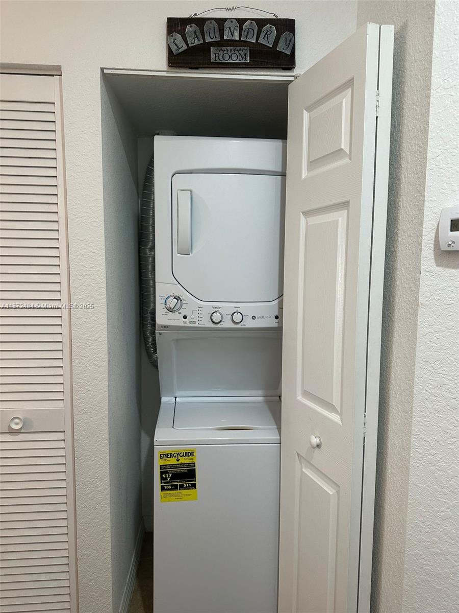 8936 Southwest 18th Street, Unit 8936 Miramar, FL 33025 - Photo 10 of 10 a utility room with washer and dryer