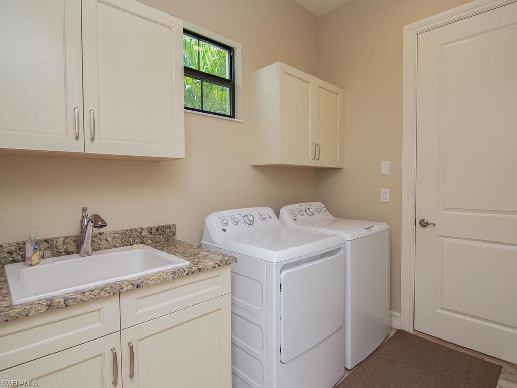 6643 Roma Way Naples, FL 34113 - Photo 26 of 35 Laundry Room