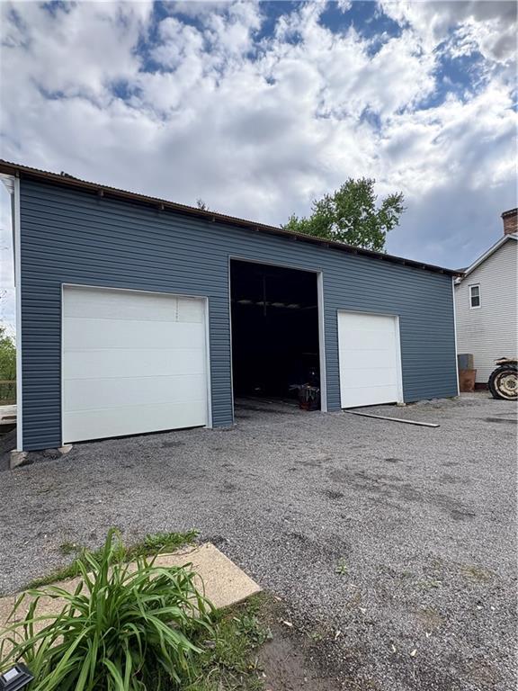 6437 Tuscarawas Road Midland, PA 15059 - Photo 35 of 35 Another view of the car enthusiast's dream garage ready for your personal touches.