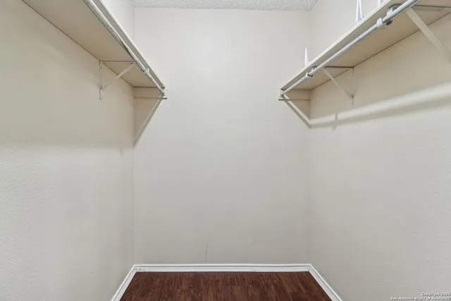 a view of small space with racks on the wall