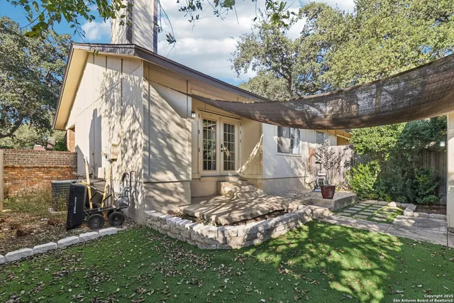a view of a back yard of the house