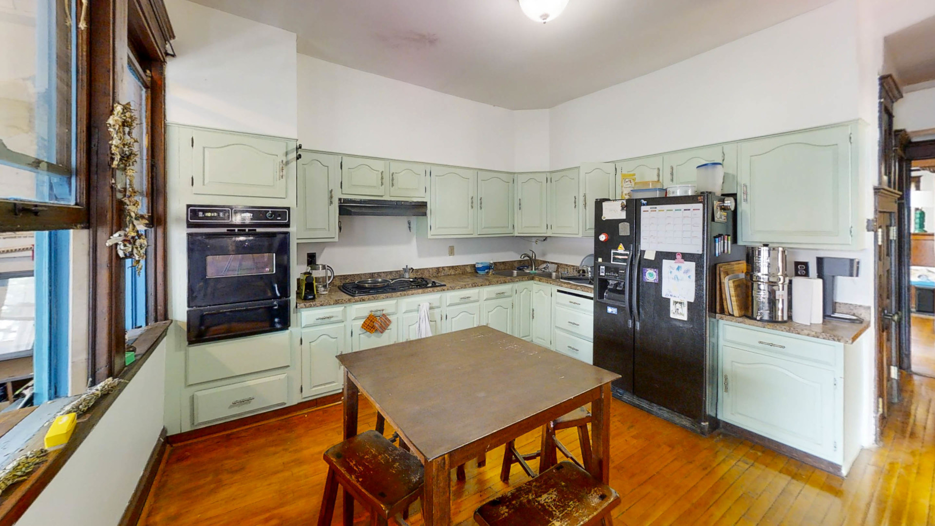 3237 West Cortez Street Chicago, IL 60651 - Photo 15 of 28 a kitchen with stainless steel appliances granite countertop a refrigerator and a stove
