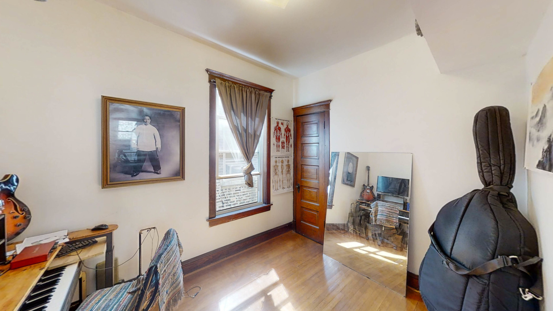 3237 West Cortez Street Chicago, IL 60651 - Photo 18 of 28 a view of a workspace with furniture and a window