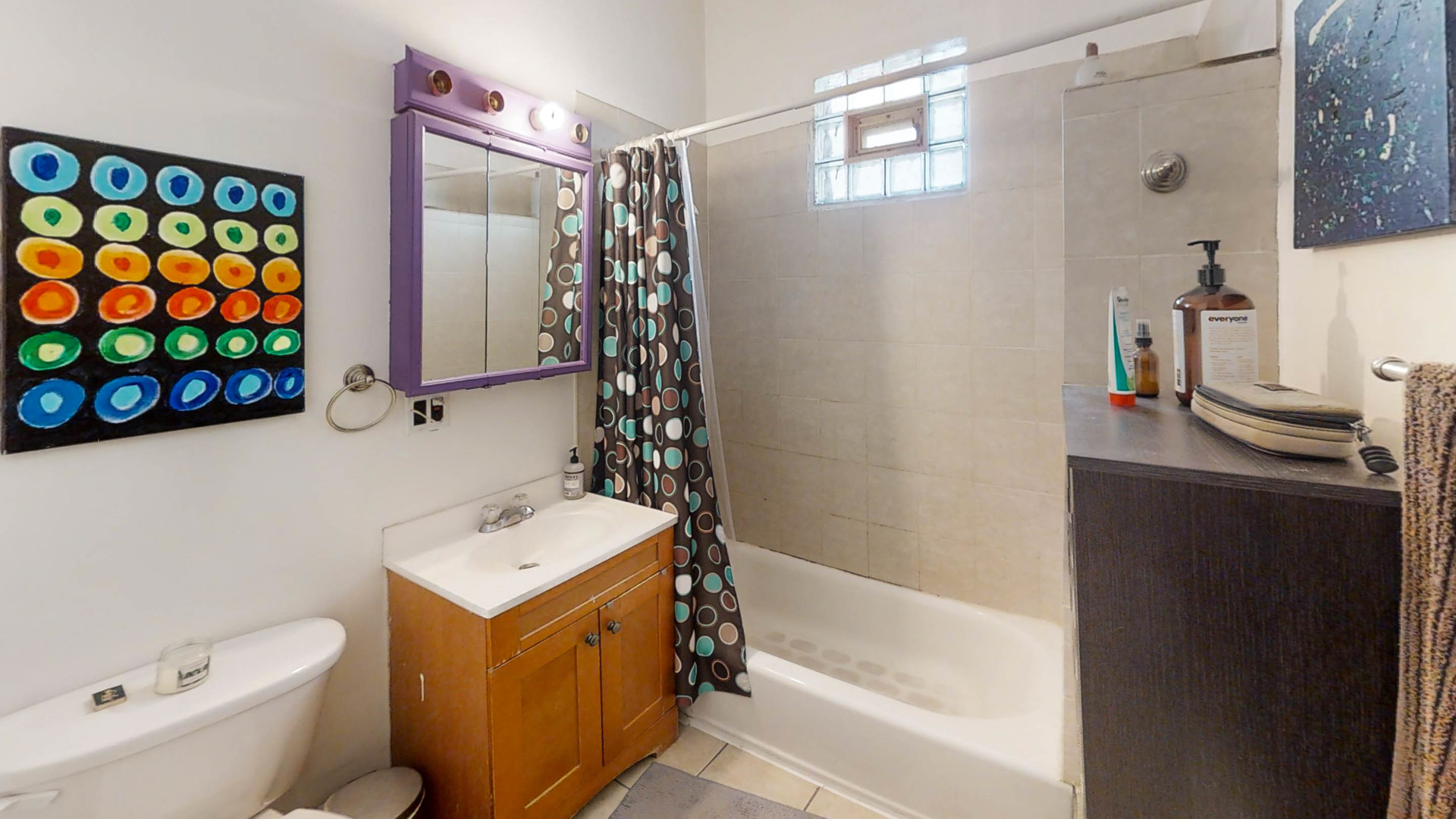 3237 West Cortez Street Chicago, IL 60651 - Photo 20 of 28 a bathroom with a sink a toilet and a bathtub