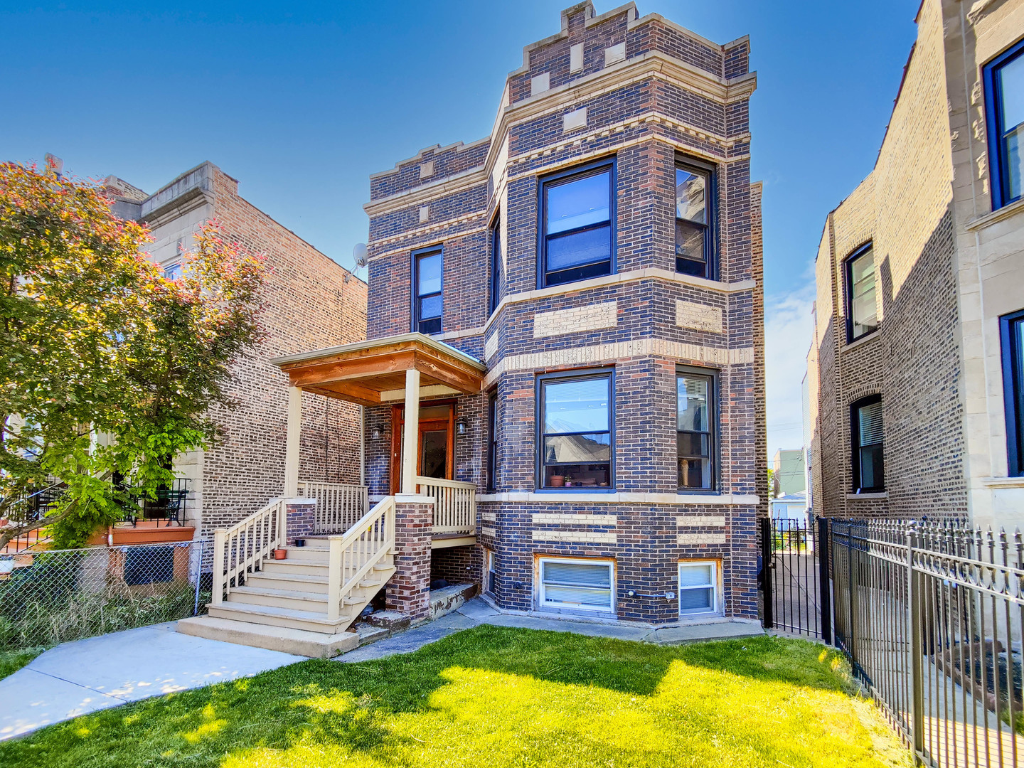 3237 West Cortez Street Chicago, IL 60651 - Photo 2 of 28 a view of a house with a swimming pool