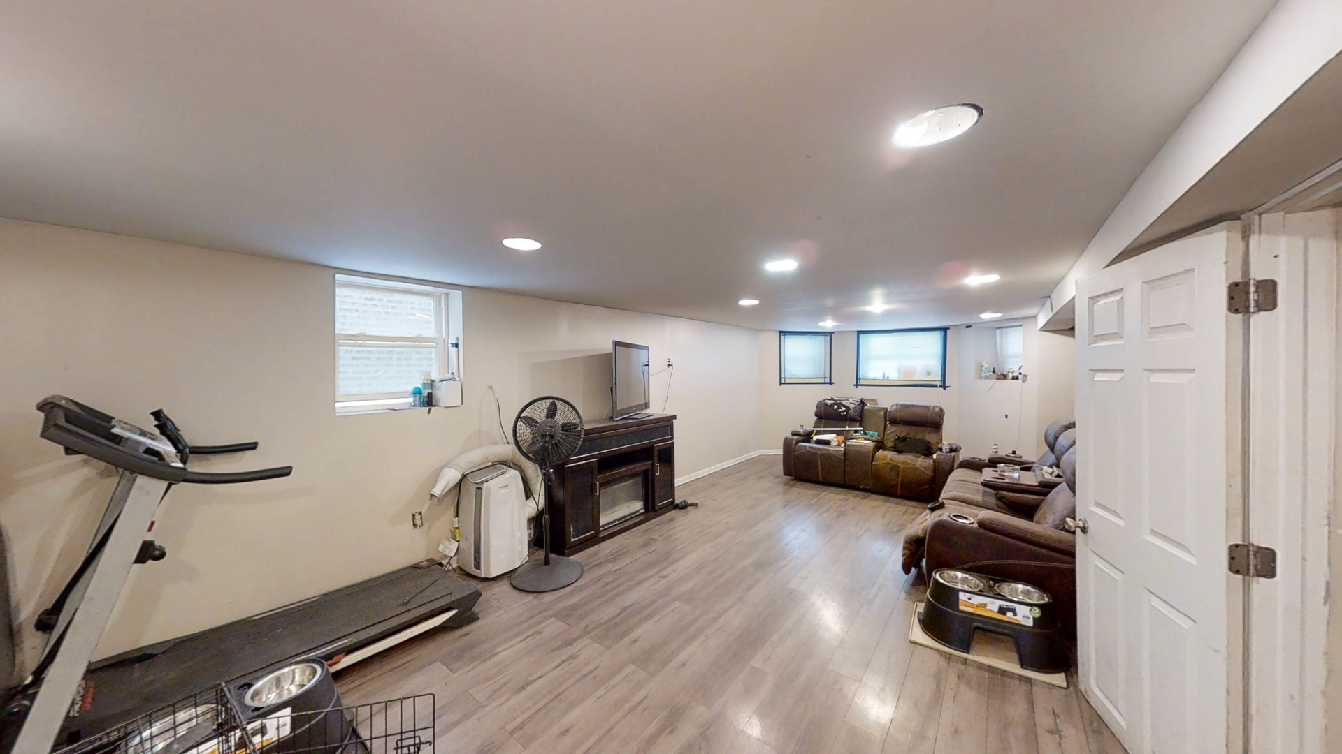 3237 West Cortez Street Chicago, IL 60651 - Photo 21 of 28 a living room with furniture and a flat screen tv