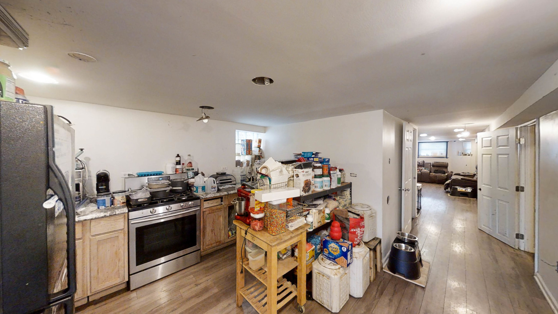 3237 West Cortez Street Chicago, IL 60651 - Photo 22 of 28 a view of a kitchen with refrigerator and workspace