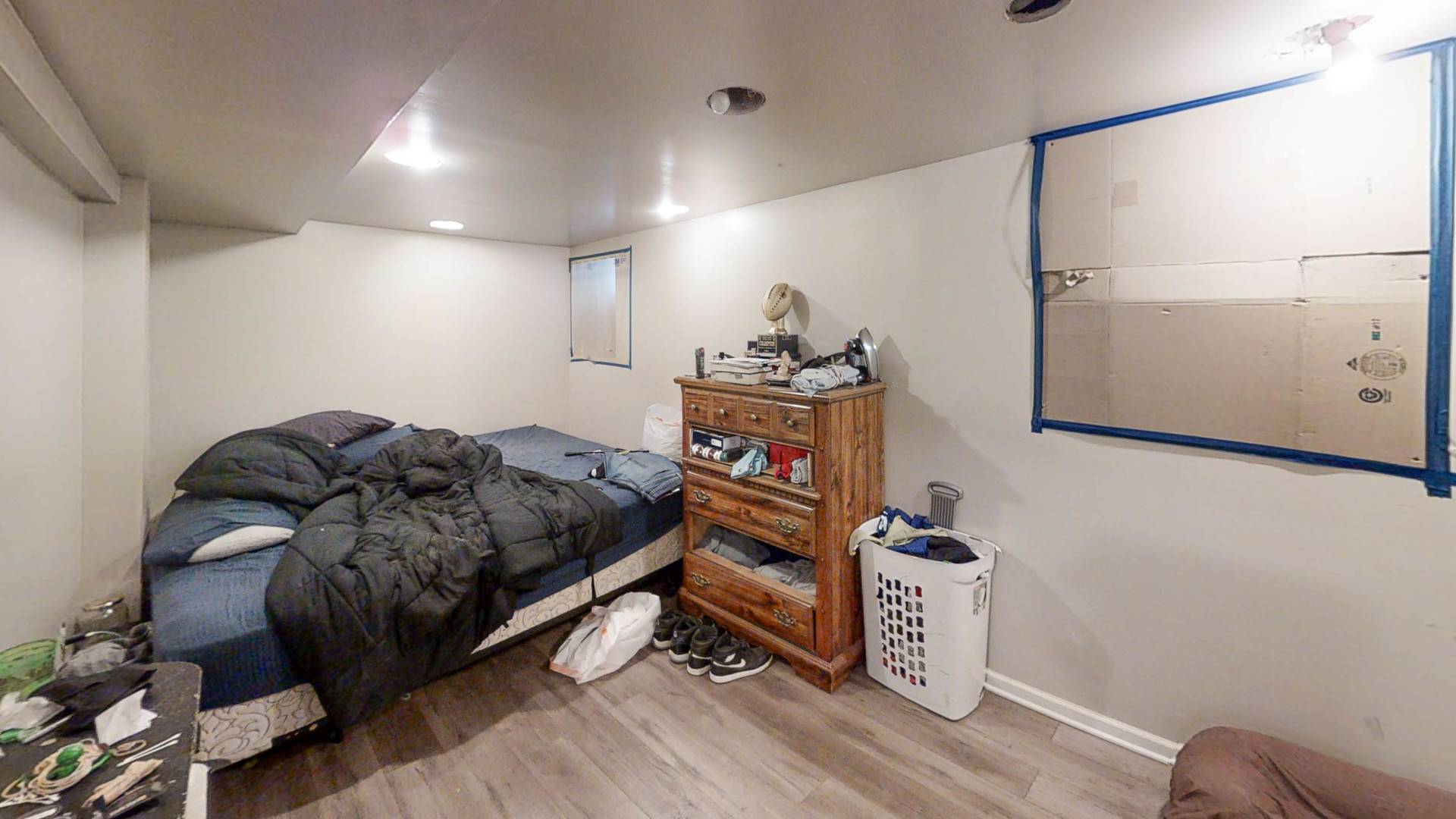 3237 West Cortez Street Chicago, IL 60651 - Photo 23 of 28 a bed room with a bed and a mirror