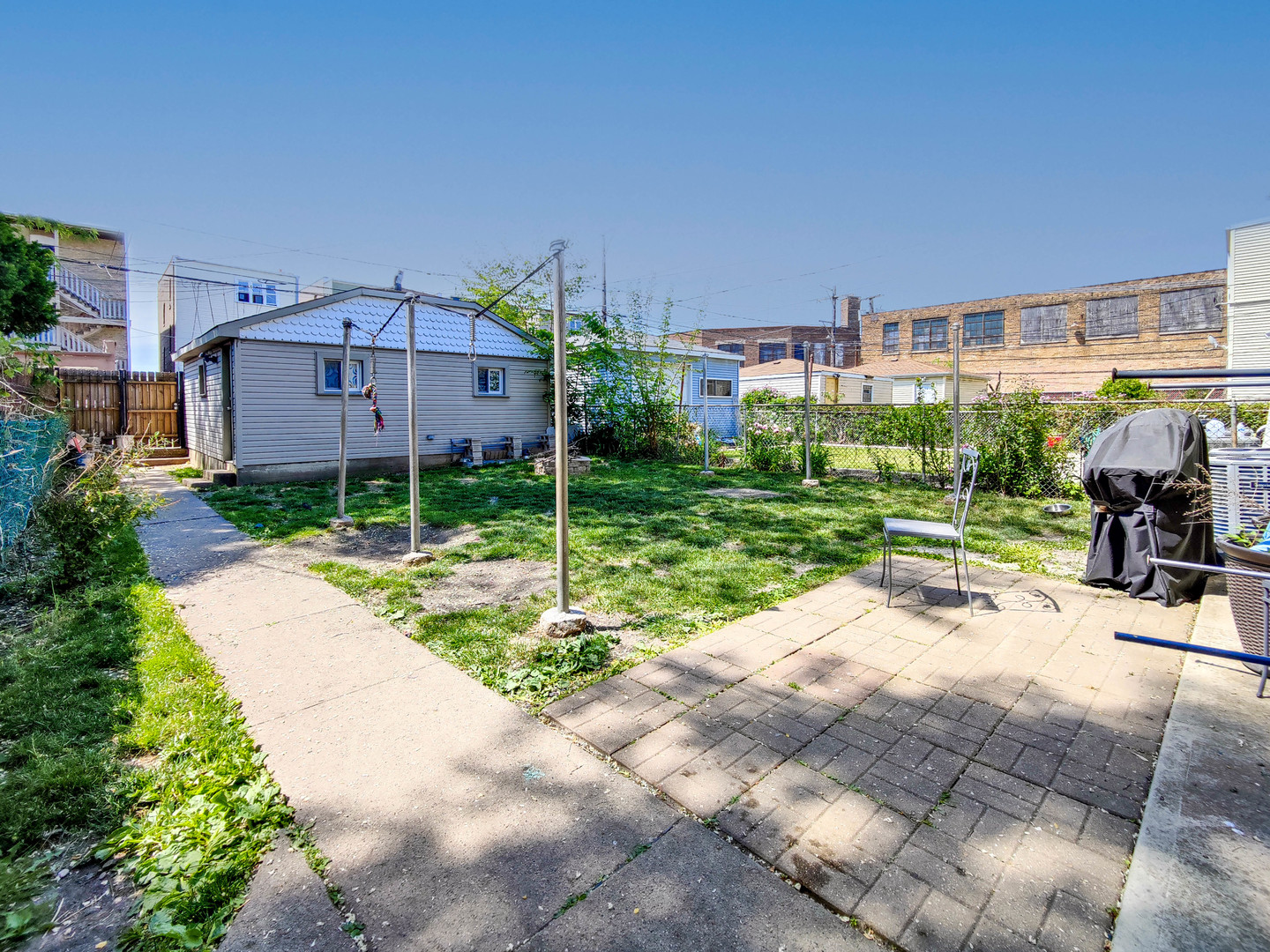 3237 West Cortez Street Chicago, IL 60651 - Photo 27 of 28 a house view with a outdoor space