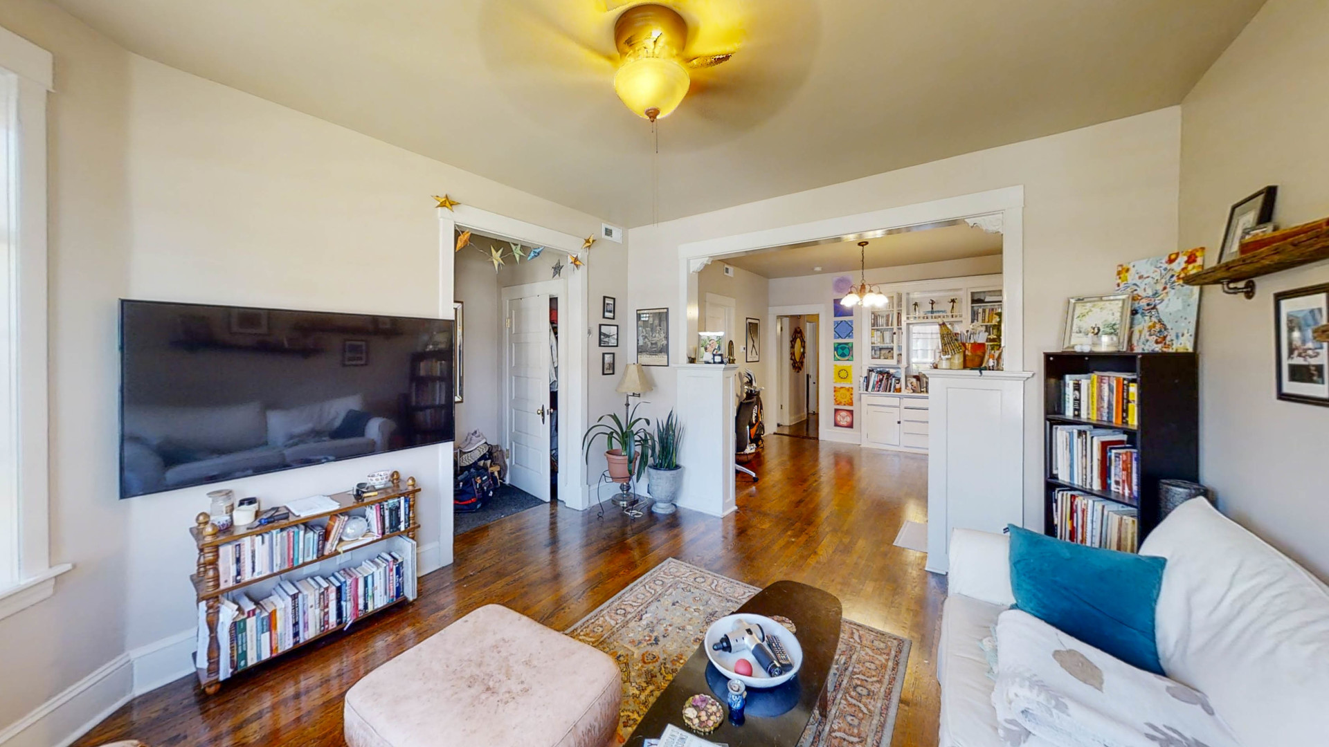3237 West Cortez Street Chicago, IL 60651 - Photo 4 of 28 a living room with furniture and a flat screen tv
