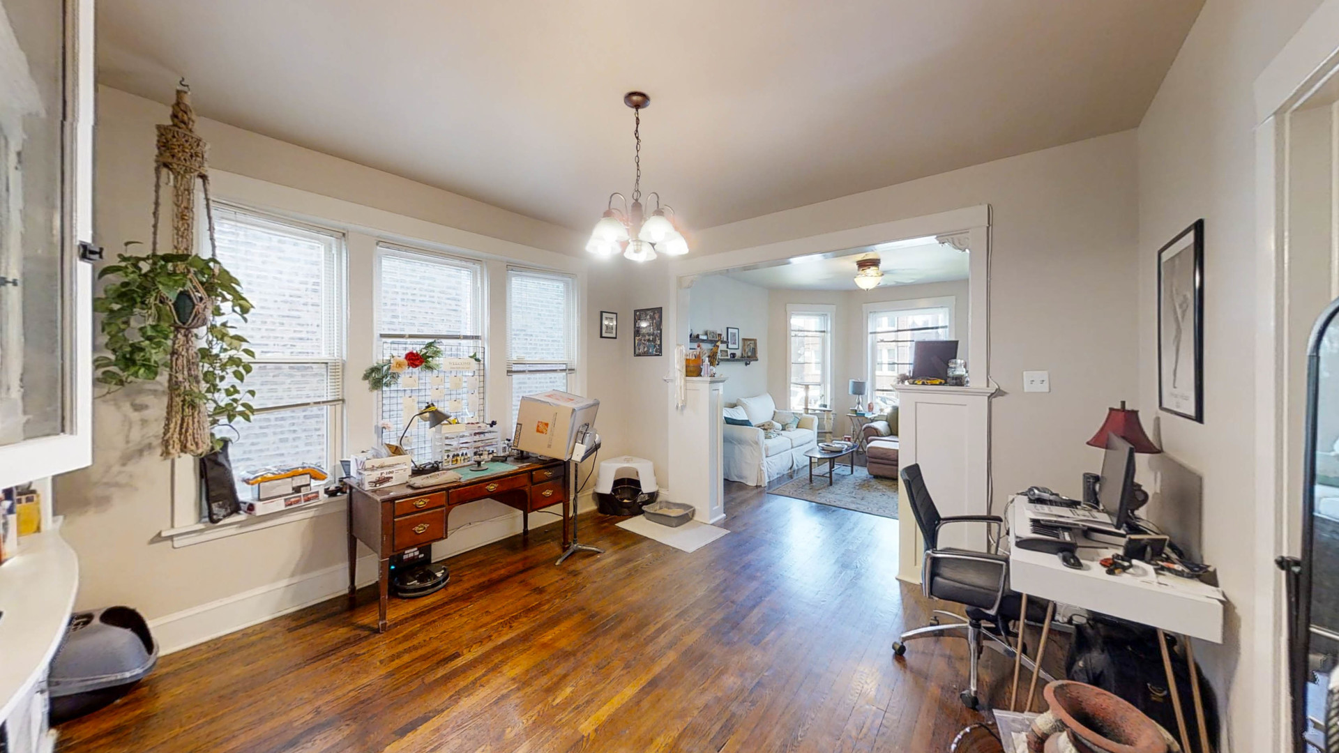 3237 West Cortez Street Chicago, IL 60651 - Photo 6 of 28 a view of a livingroom with workspace and a window