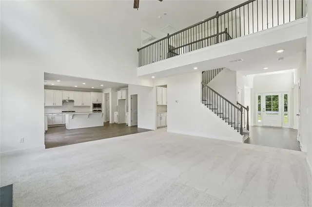 a view of a hallway with staircase