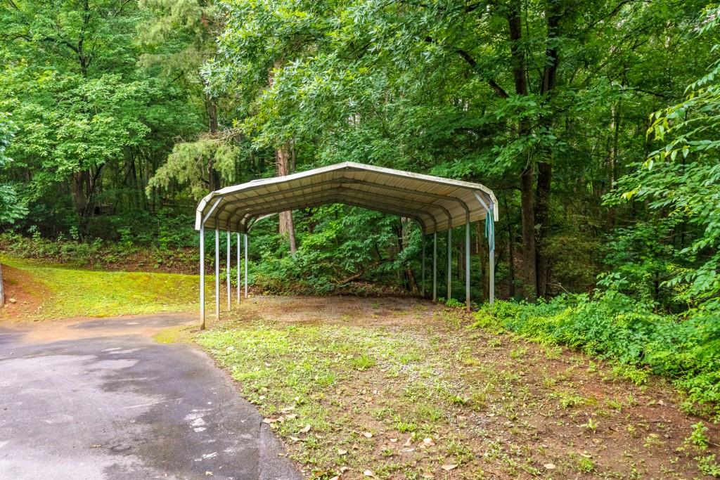 176 Big Oak Tree Road Northwest Adairsville, GA 30103 - Photo 73 of 77 a view of a backyard with swimming pool