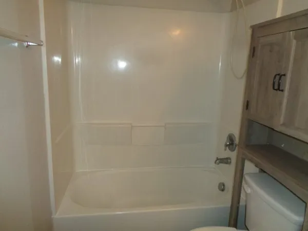 a close view of a bathtub in bathroom
