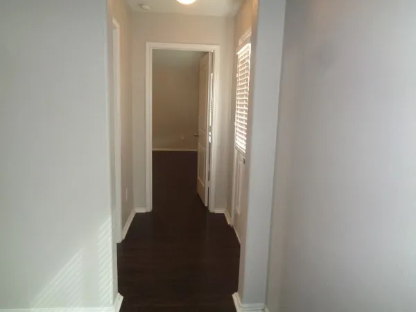 a view of hallway with stairs