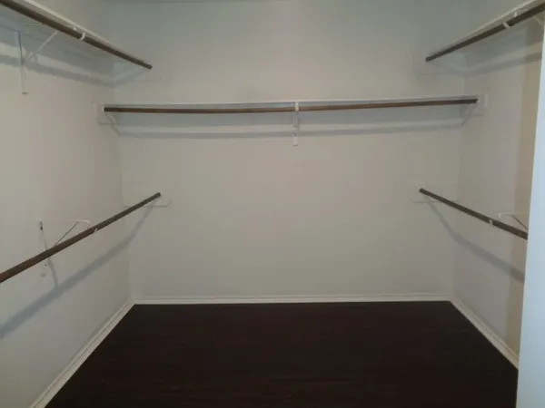 a view of an empty walk in closet