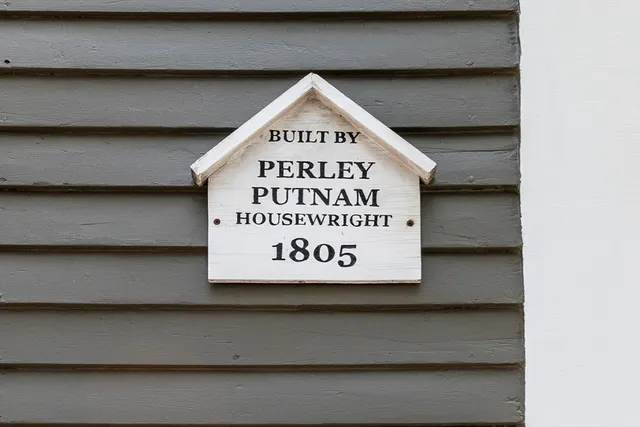 a sign that is on the side of a building