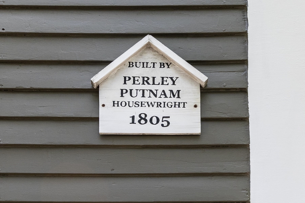 10 Andrew Street, Unit 2A Salem, MA 01970 - Photo 27 of 27 a sign that is on the side of a building