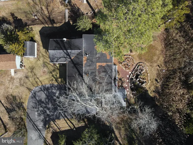 an aerial view of a house with lake view