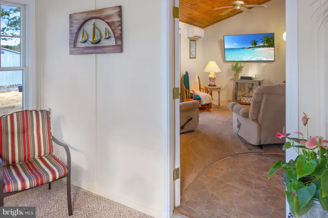 a bathroom with a mirror and a shower