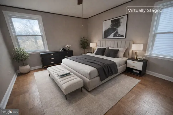 a bedroom with a bed furniture and a window