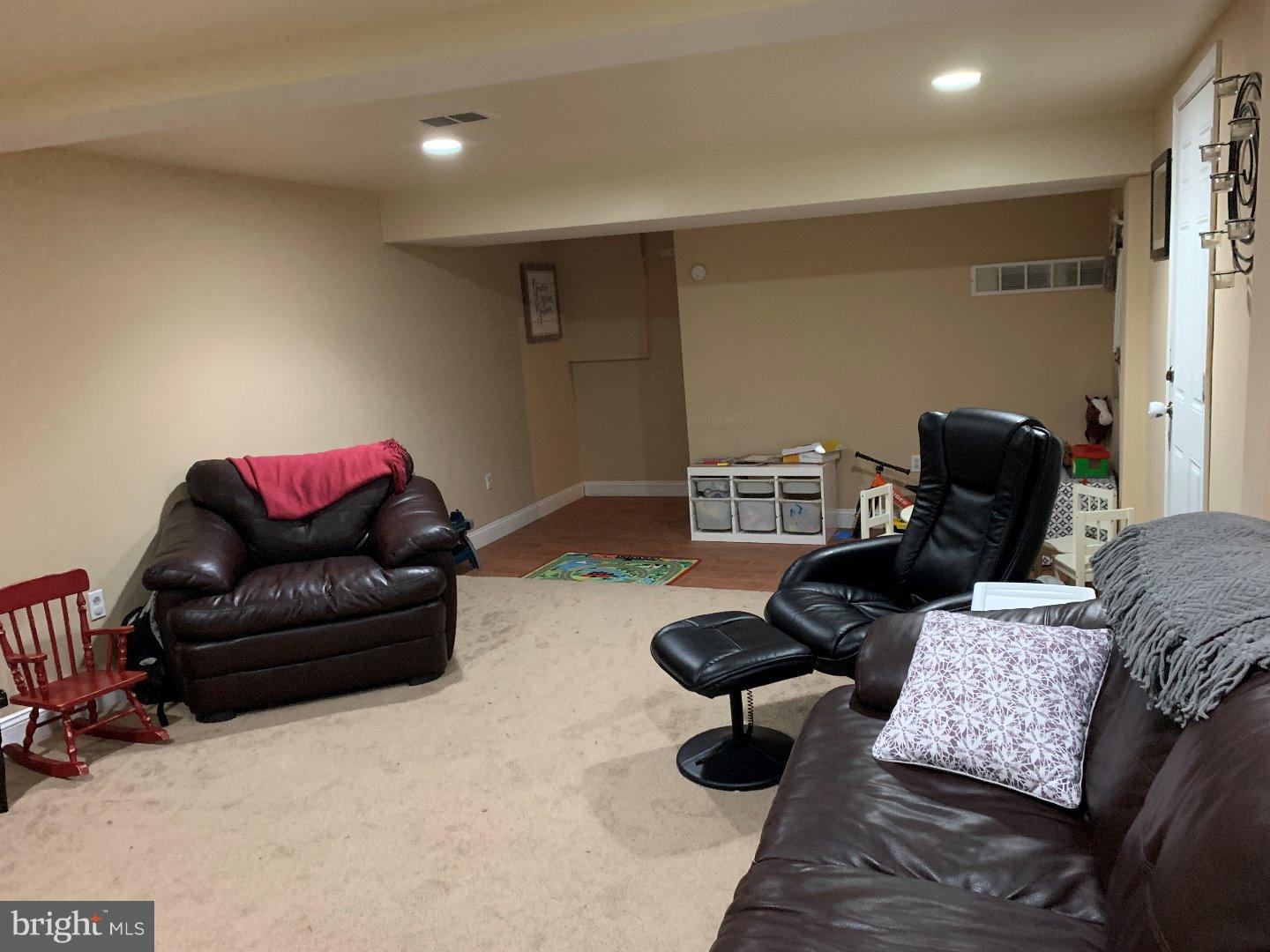 555 Chestnut Street, Unit REAR West Reading, PA 19611 - Photo 10 of 11 a living room with furniture and a couch