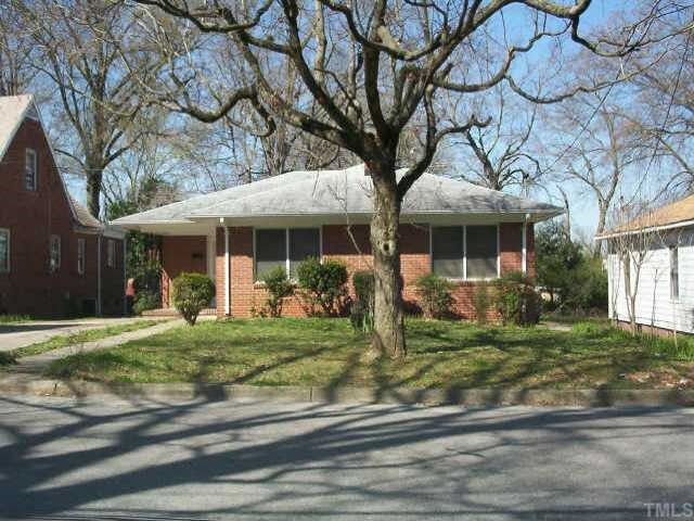 609 Chamberlain Street Raleigh, NC 27607 - Photo 1 of 1 a front view of a house with a yard