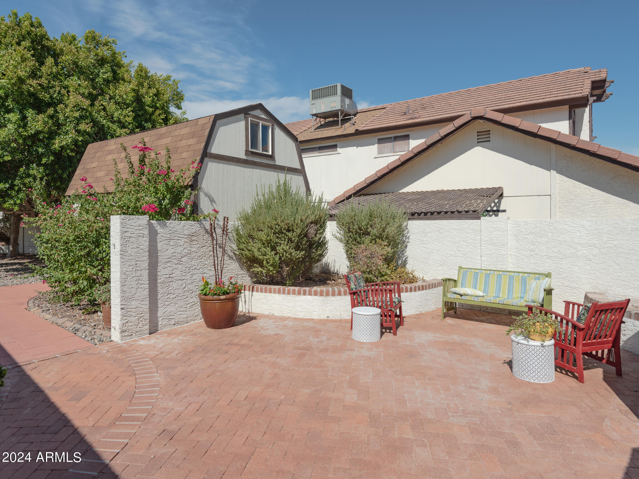 4550 East Corral Road Phoenix, AZ 85044 - Photo 11 of 54 A charming courtyard to greet all