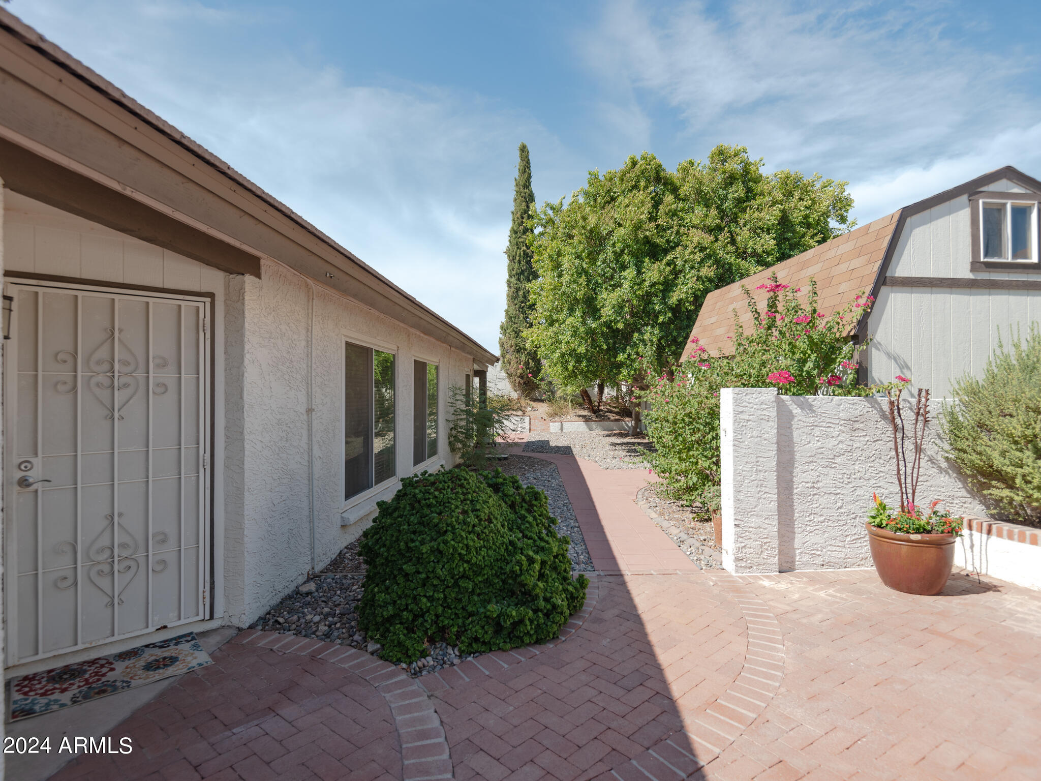 4550 East Corral Road Phoenix, AZ 85044 - Photo 10 of 54 Open the gate to a front patio