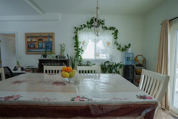a view of a dining room with furniture