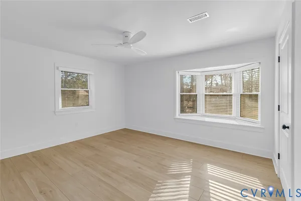 a view of a park with lots of trees