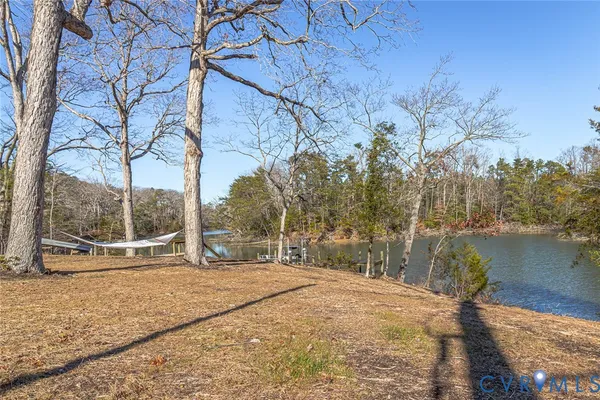 a park view with a bench in the patio