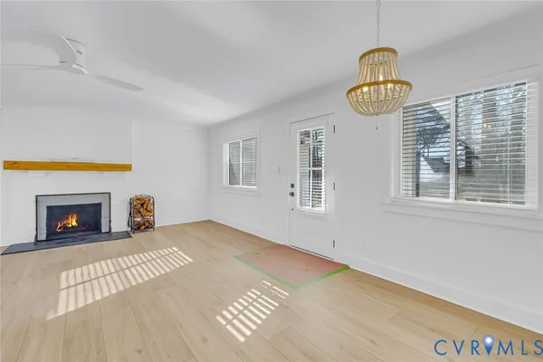 a view of a kitchen with a sink and a window