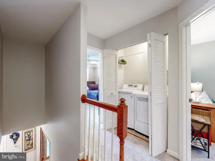 a bath tub sitting next to a bathroom sink