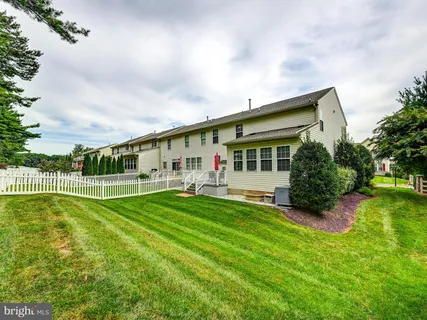 a bed room with a bed and furniture