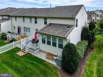 a picture of a room with a floor to ceiling window