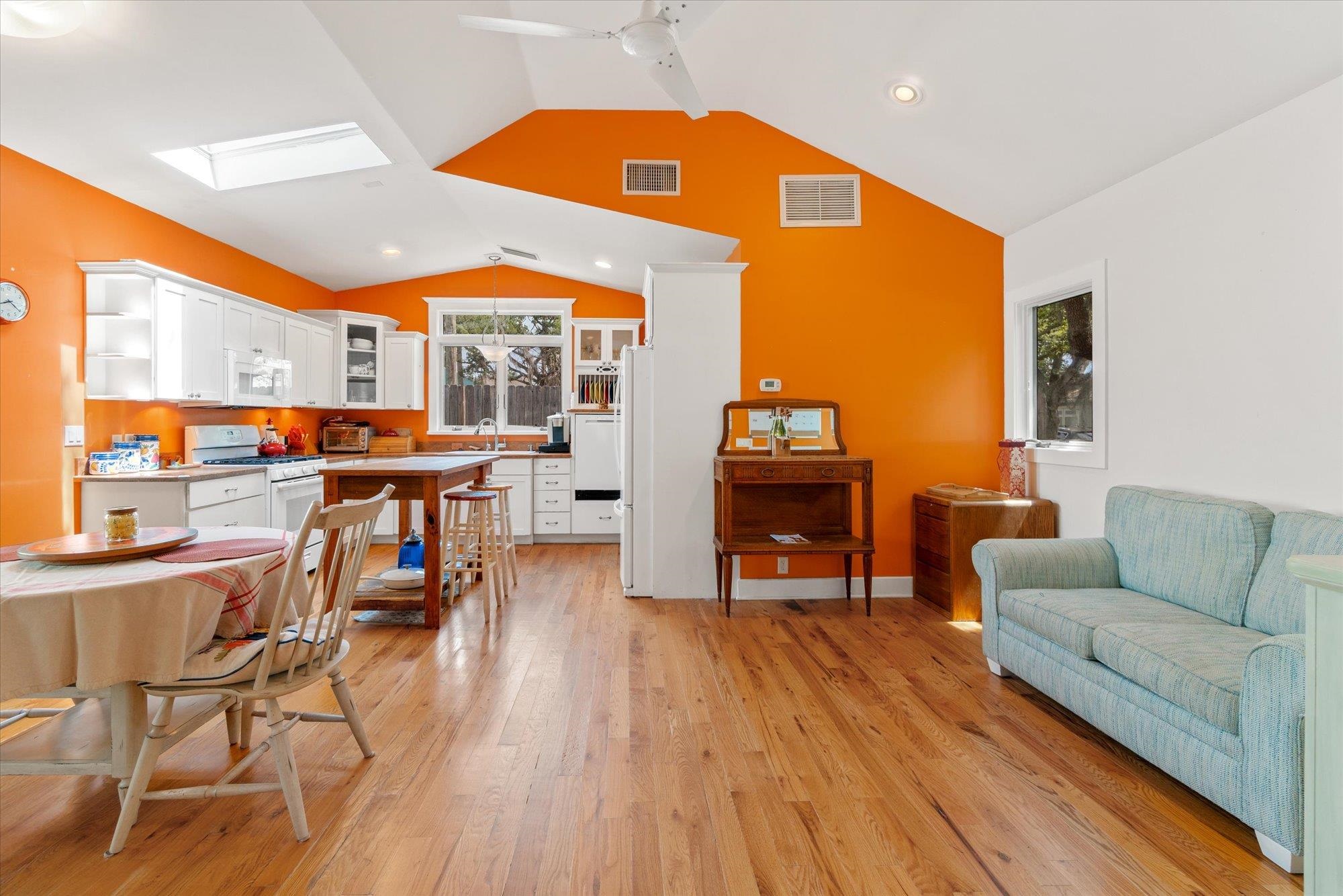 68 Kings Ferry Way St. Augustine, FL 32084 - Photo 11 of 52 Living room with light wood flooring, a skylight, recessed lighting, and a ceiling fan
