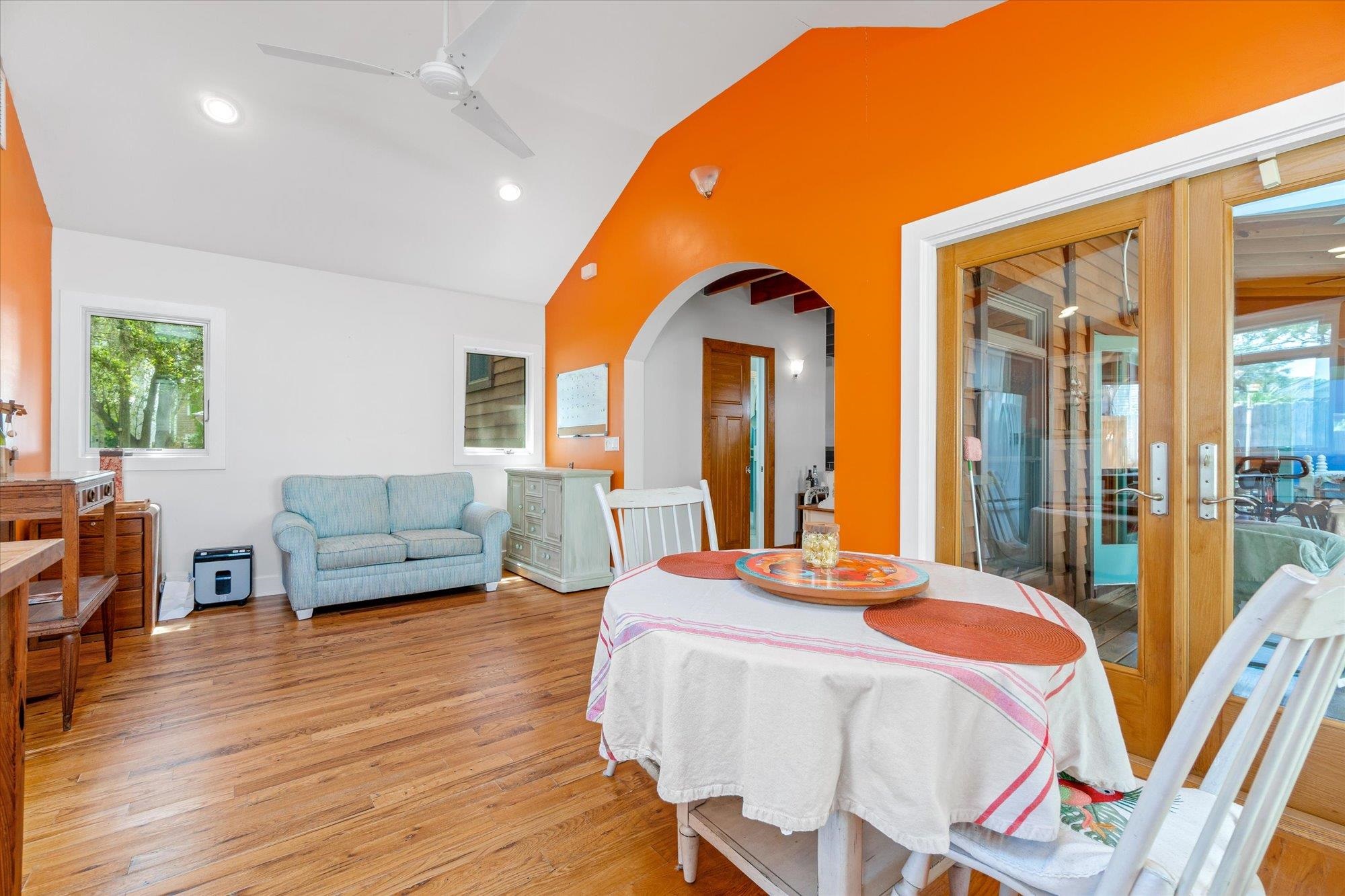 68 Kings Ferry Way St. Augustine, FL 32084 - Photo 14 of 52 Dining area with ceiling fan, light wood finished floors, lofted ceiling, recessed lighting, and french doors