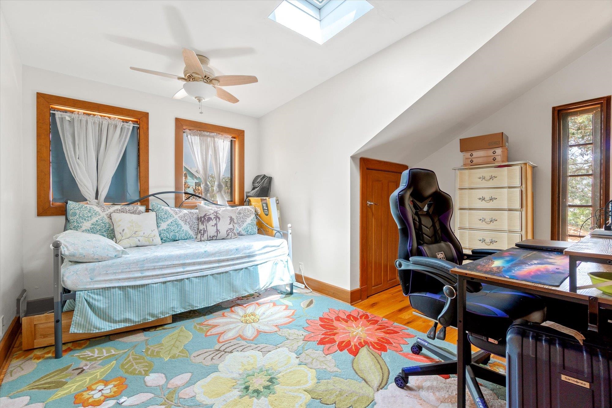 68 Kings Ferry Way St. Augustine, FL 32084 - Photo 28 of 52 Loft Office area with a skylight, light wood flooring, a ceiling fan, and lofted ceiling