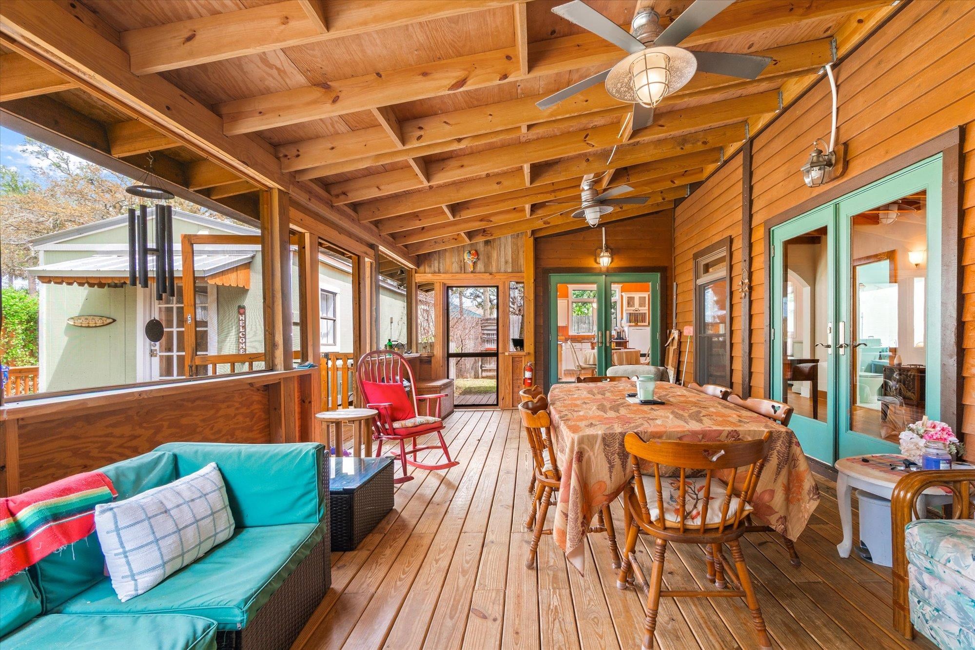 68 Kings Ferry Way St. Augustine, FL 32084 - Photo 31 of 52 Back screened porch with french doors, lofted ceiling with beams, and a deck